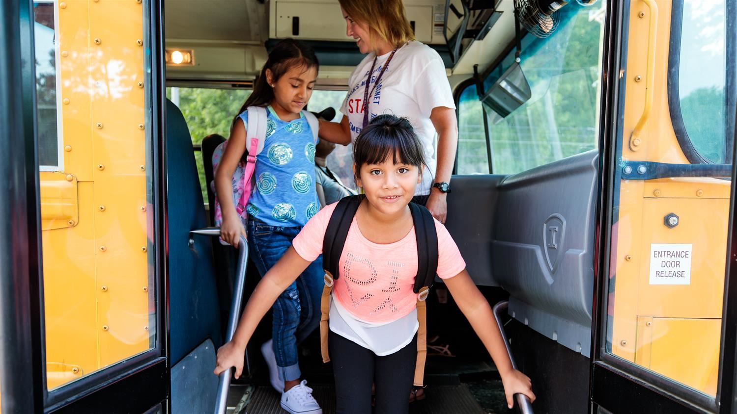 Image of students exiting bus