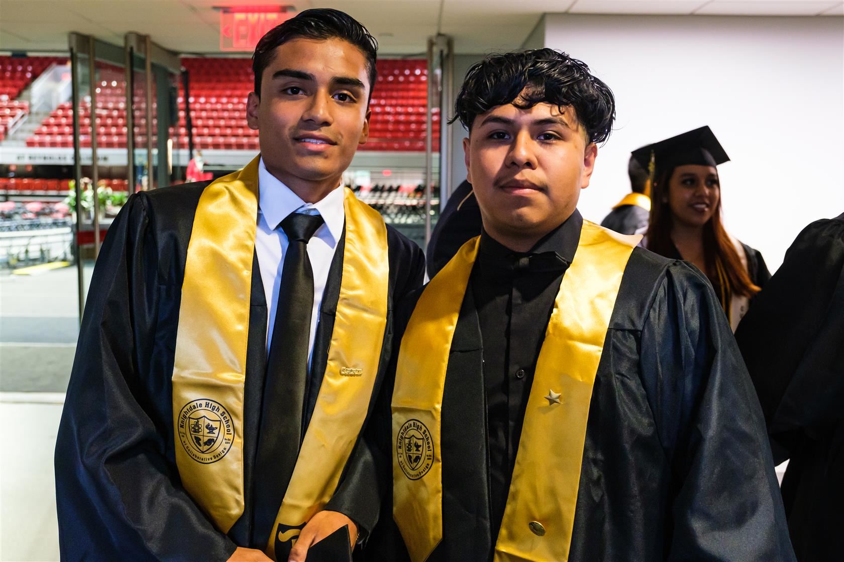 Two young men graduating