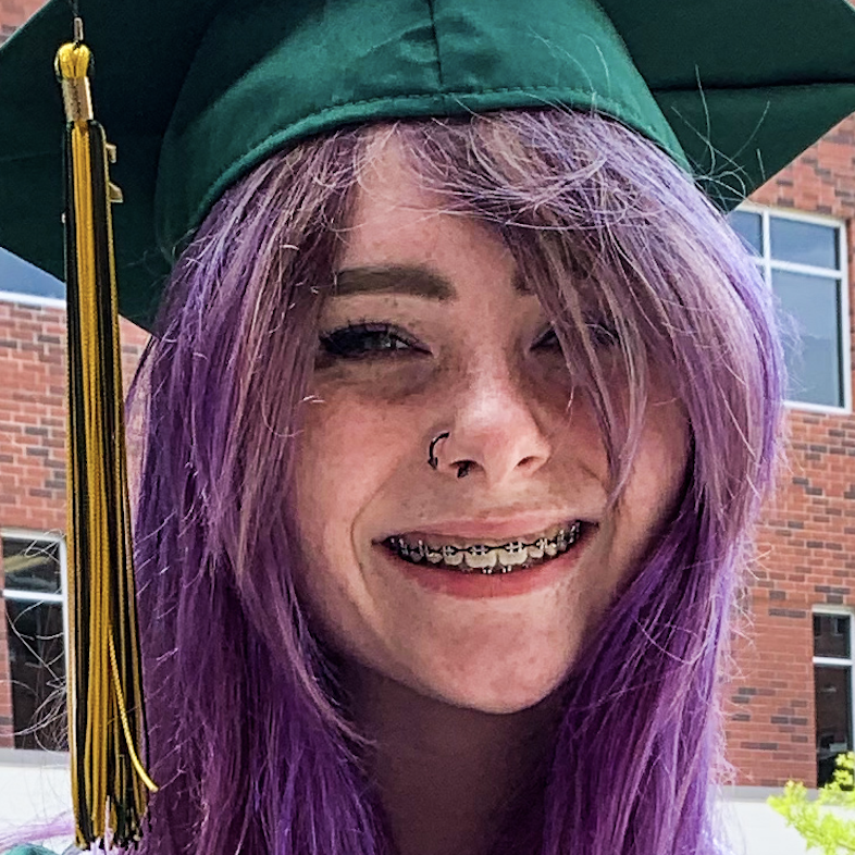 graduate with purple hair 