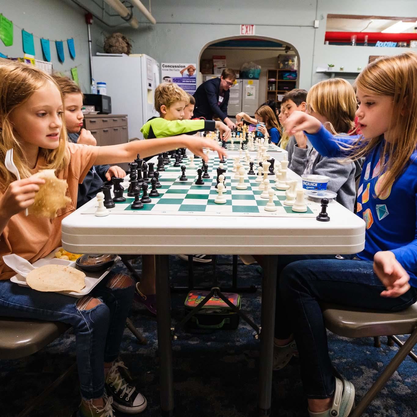 Students playing chess.