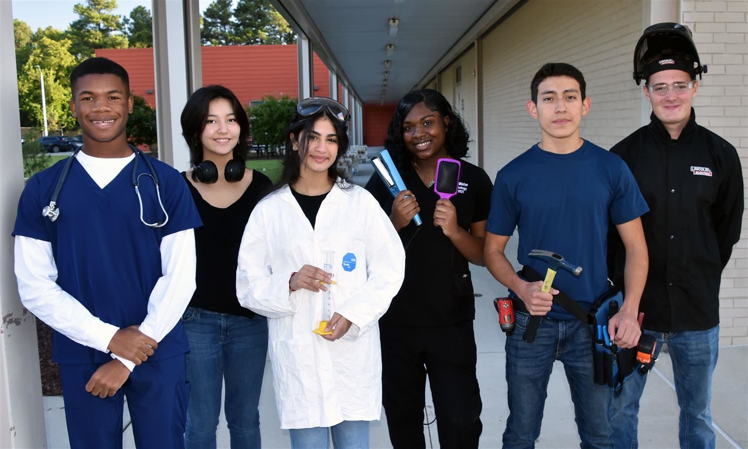 Students wearing program area uniforms