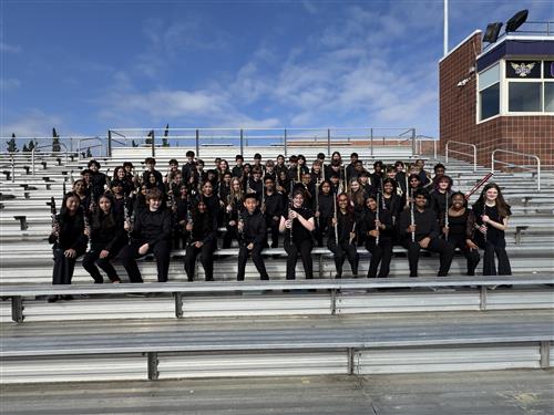 Photo of symphonic band students on bleachers at MPA