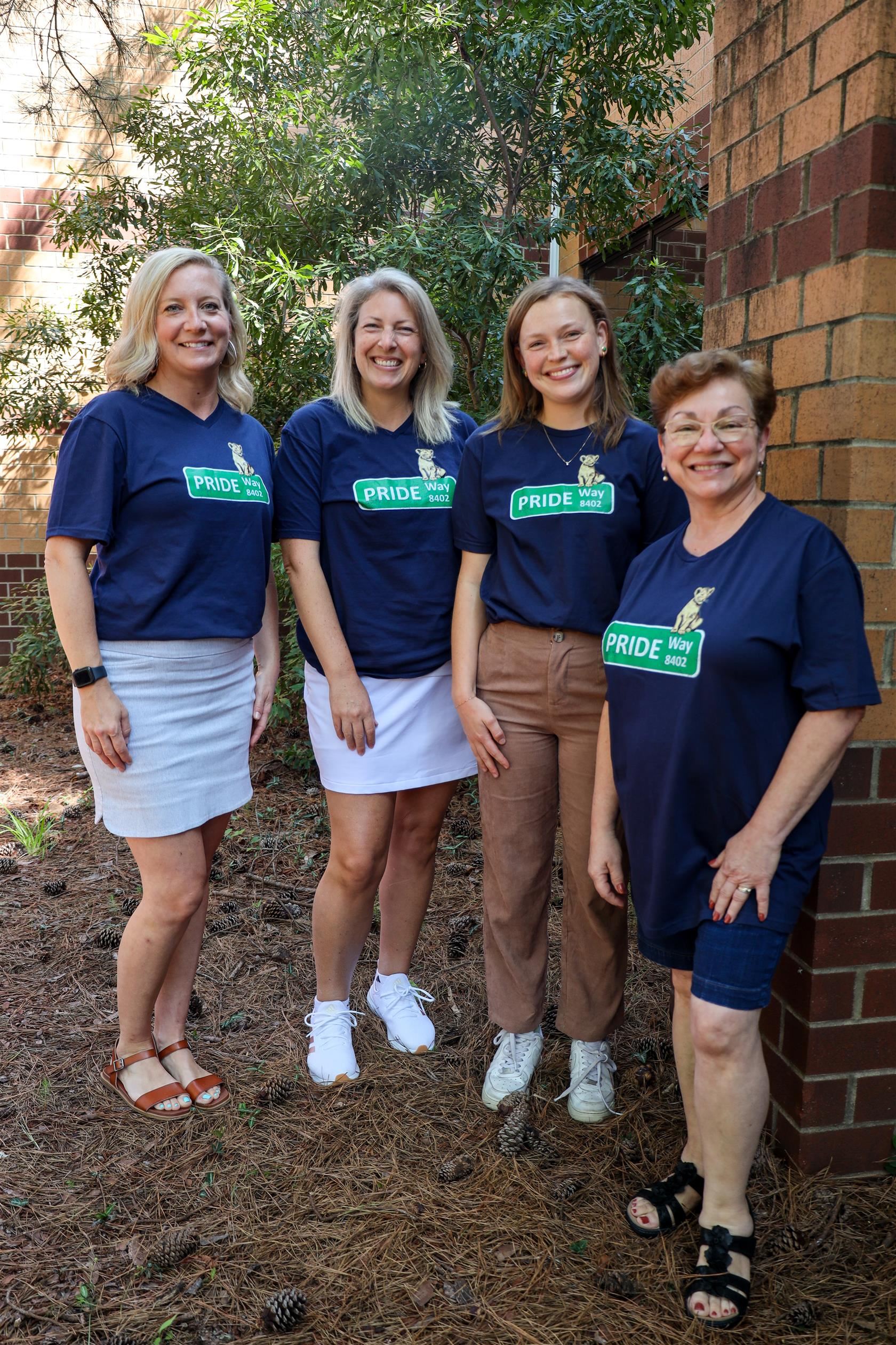 4th Grade teachers in the staff shirts