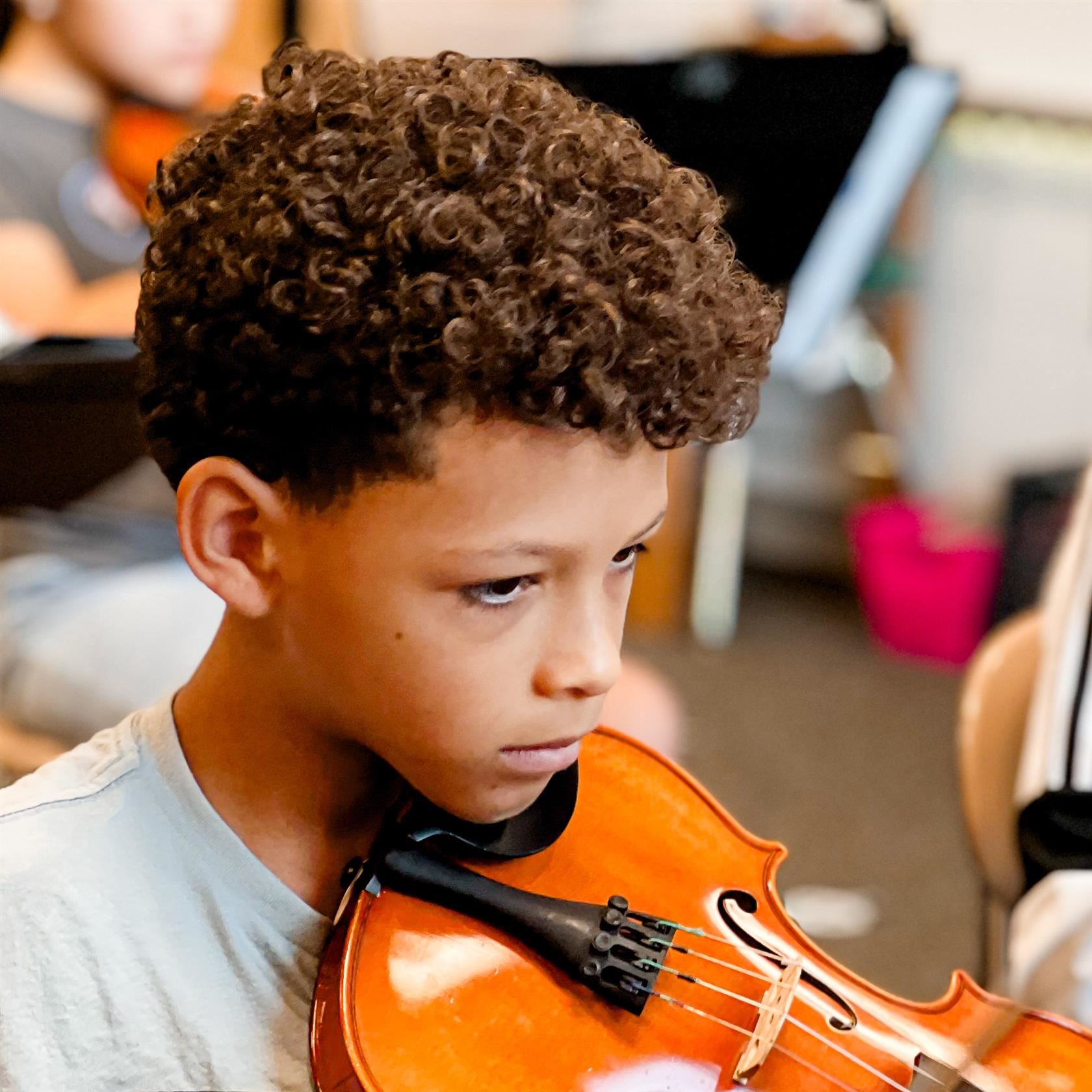 A student playing violin 