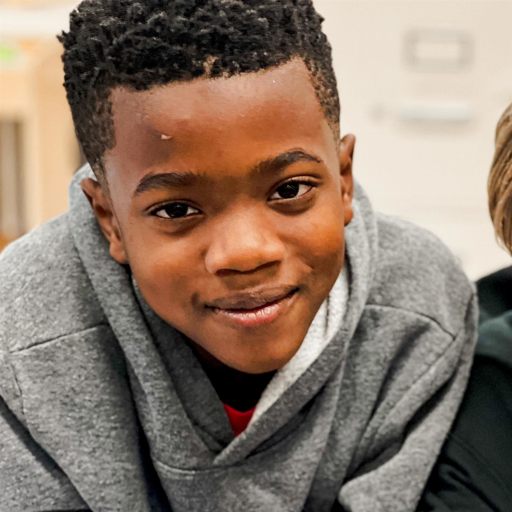  A student smiles at the camera