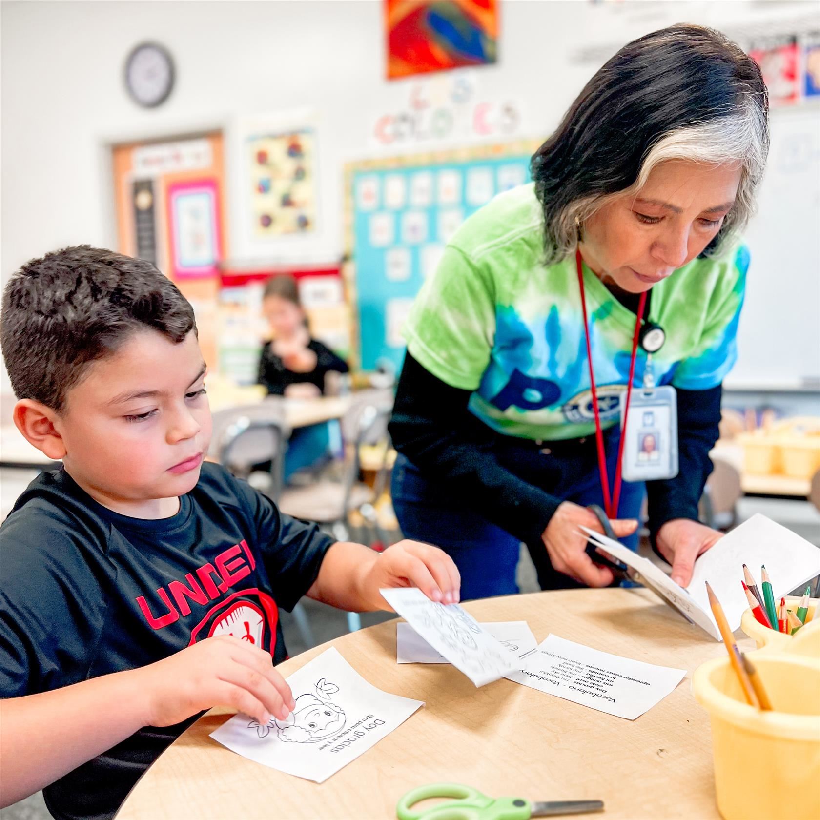  A teacher and student work together