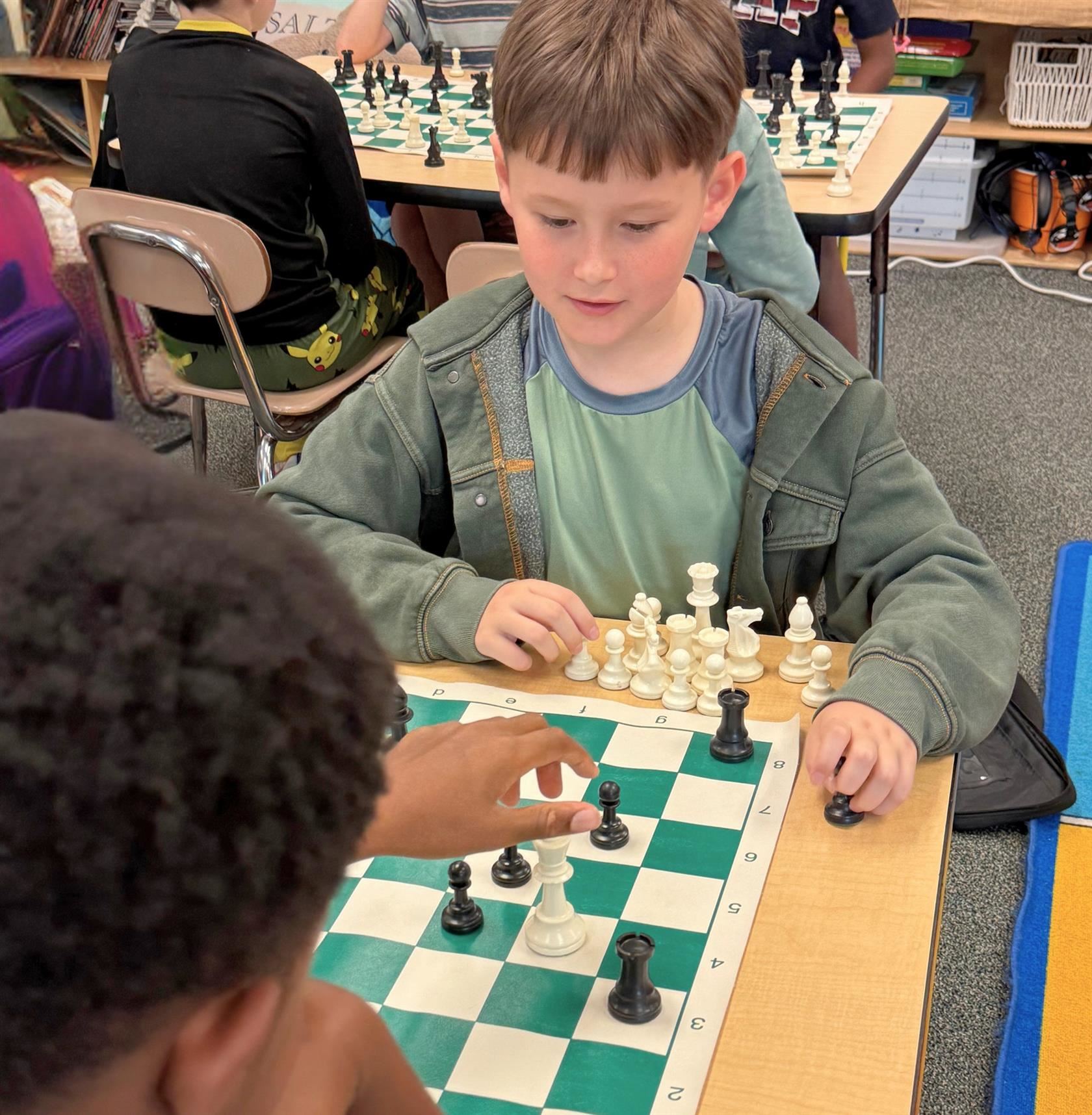  two students playing chess