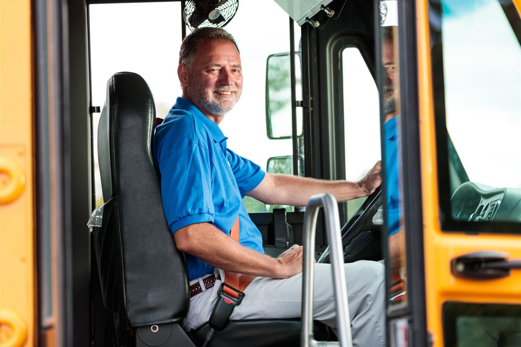 smiling bus driver