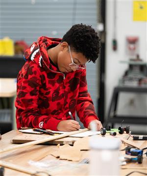 Photo of a student in engineering class