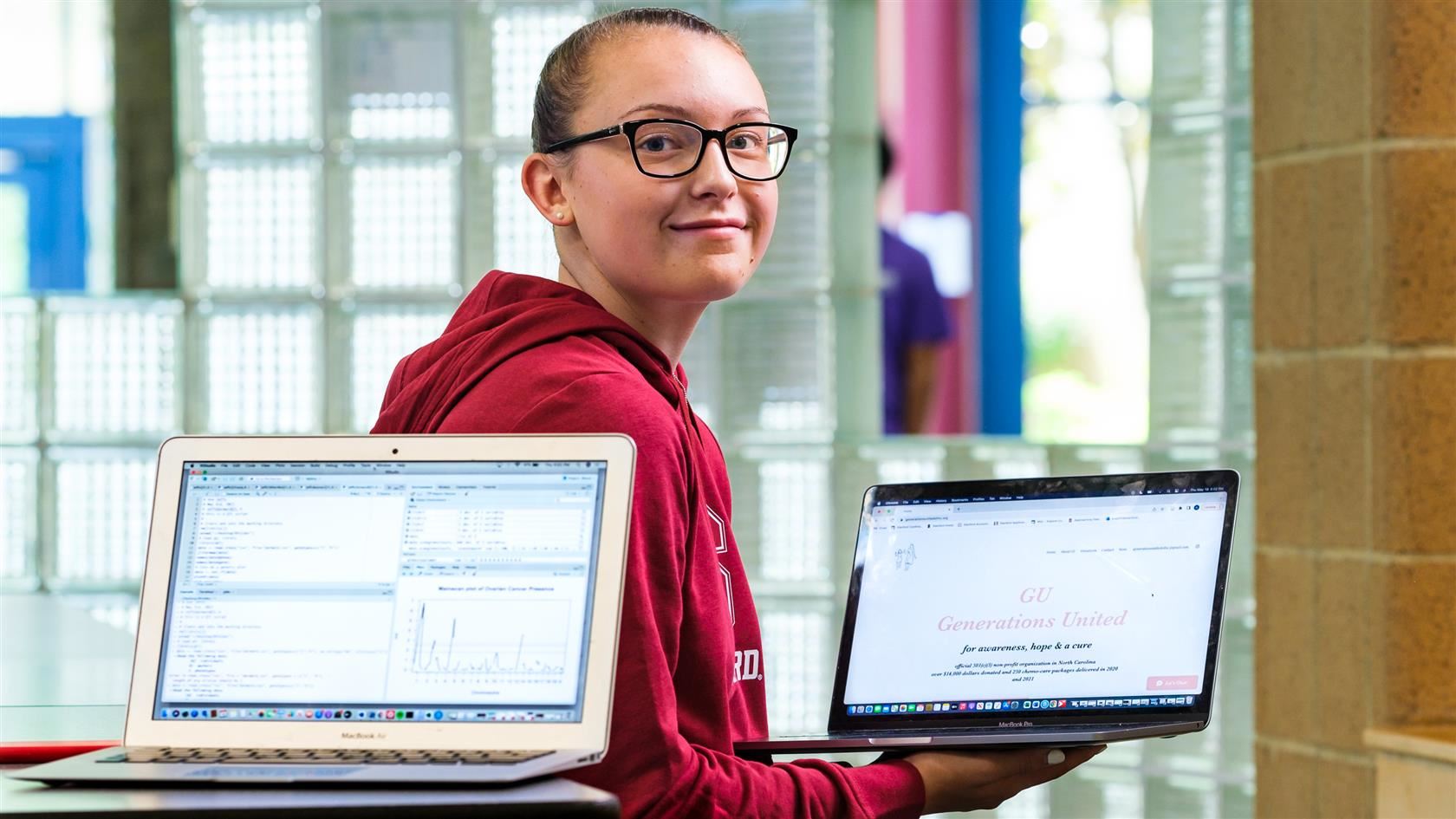 ava jeffs with two laptops