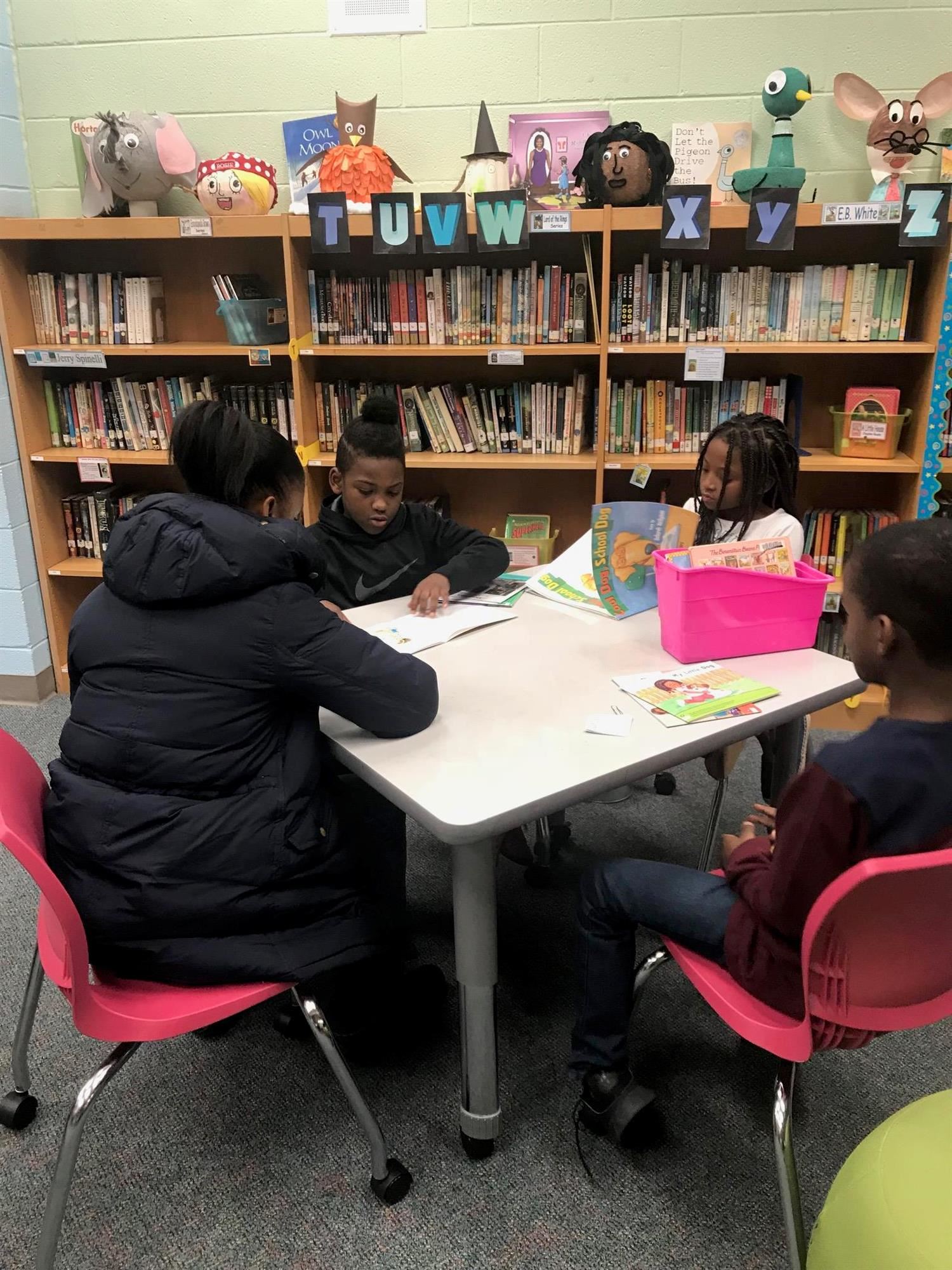 students working in the media center