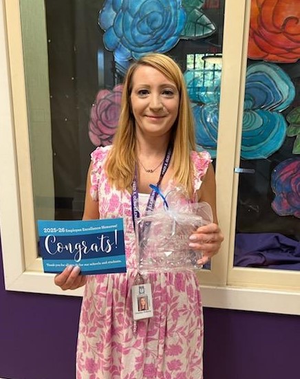  Ms. Halladay receives Employee Excellence award.