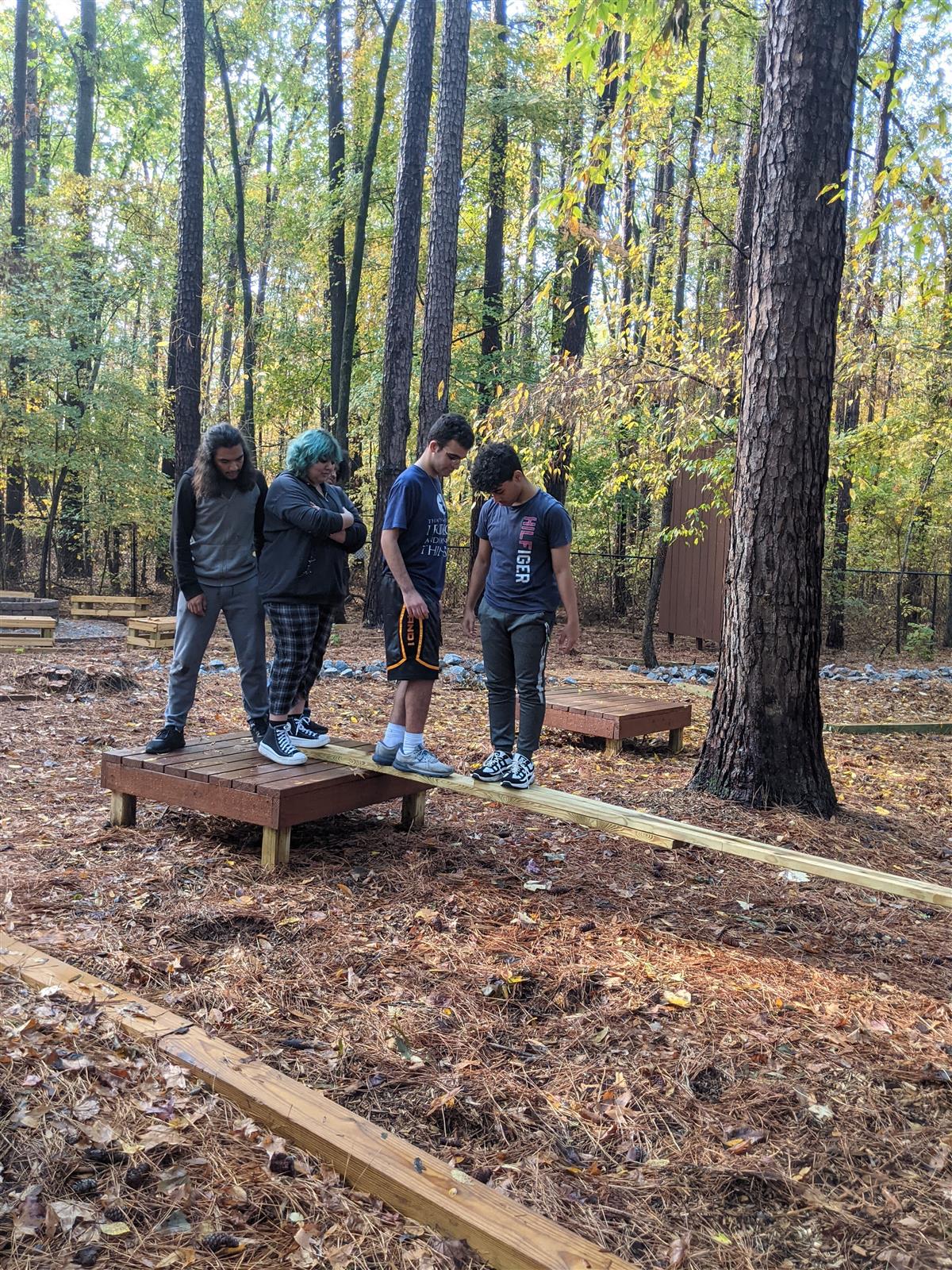 Picture of ATAM students doing team building at Bond Park