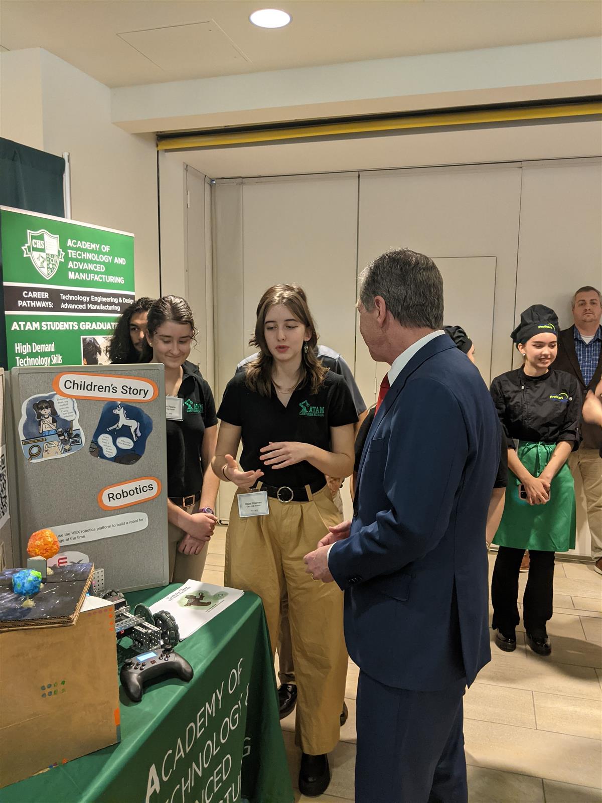 ATAM student Hazel Cochran Explaining her project to the Governor