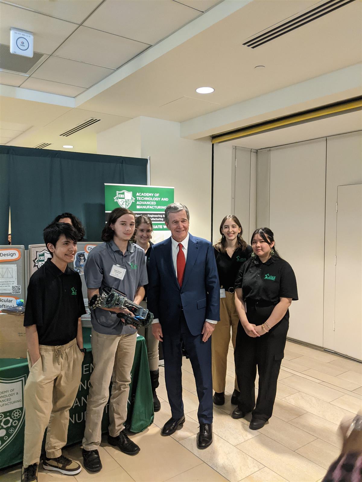 Governor Cooper with ATAM Students at NCBCE 40th Anniversary Celebration